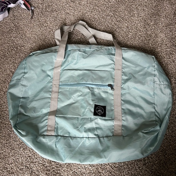 Wind blows river flows blue water proof large duffel bag - Picture 5 of 6